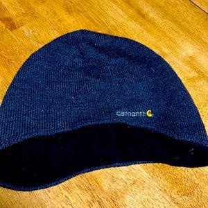 Carhartt navy blue winter hat with over ear coverage